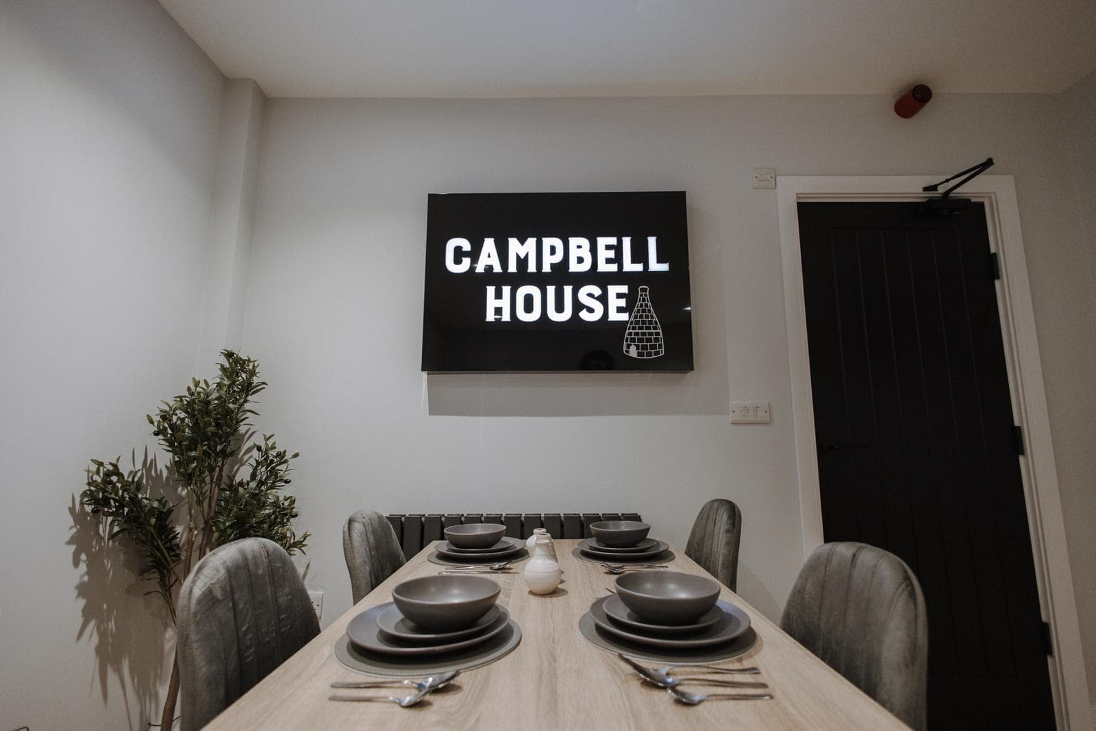 Dining area with Campbell House sign